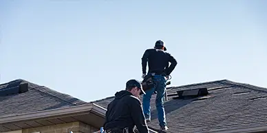 Roofing crew performing a residential roof inspection in Apopka, Florida