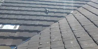 Tile roof damage being repaired on a residential home in Eustis, Florida
